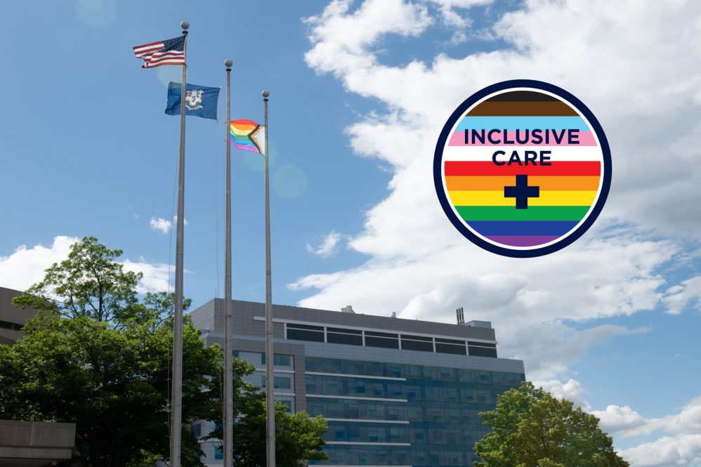 photo of University Tower with U.S., Connecticut, and Pride flags, and "Inclusive Care" logo