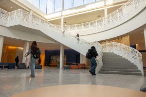 UConn students walk through the Gant Science Complex