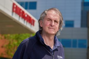 Peter Canning outdoor portrait in front of emergency department entrance