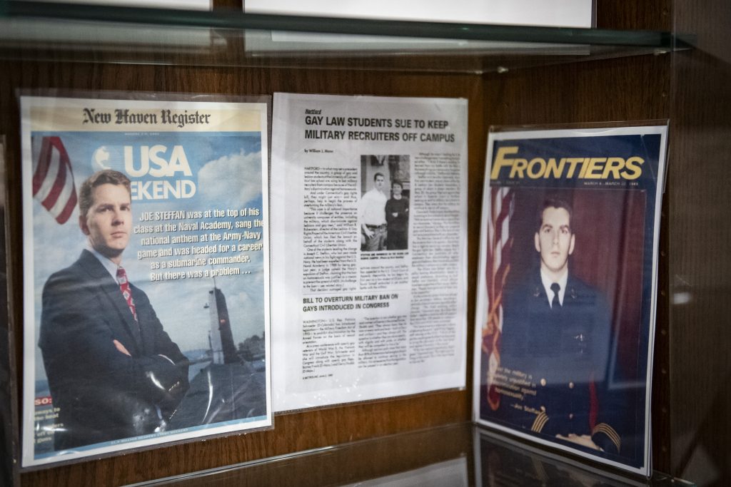 A display shows two magazine covered with photos of a young Joe Steffan.