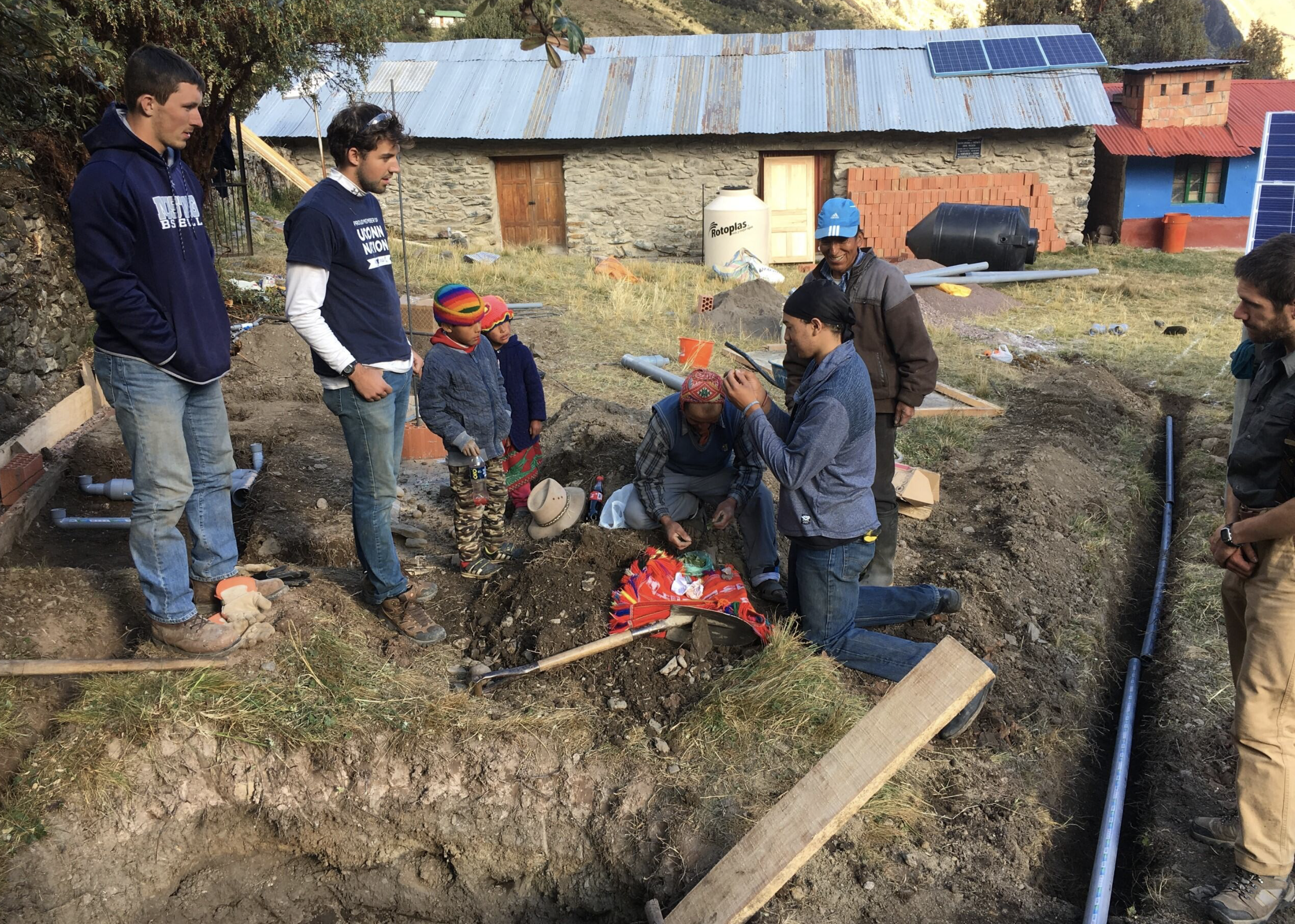 Researchers work in a village in Peru.