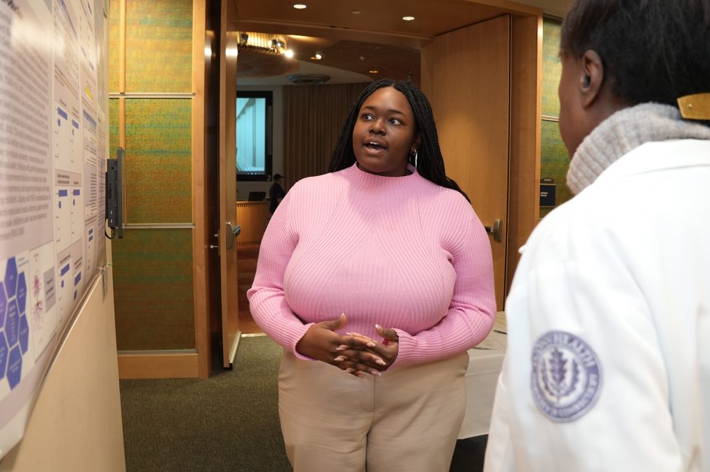 Second-year UConn medical student Stephanie Chinwo presenting her findings to Dr. Marja Hurley on March 7. 