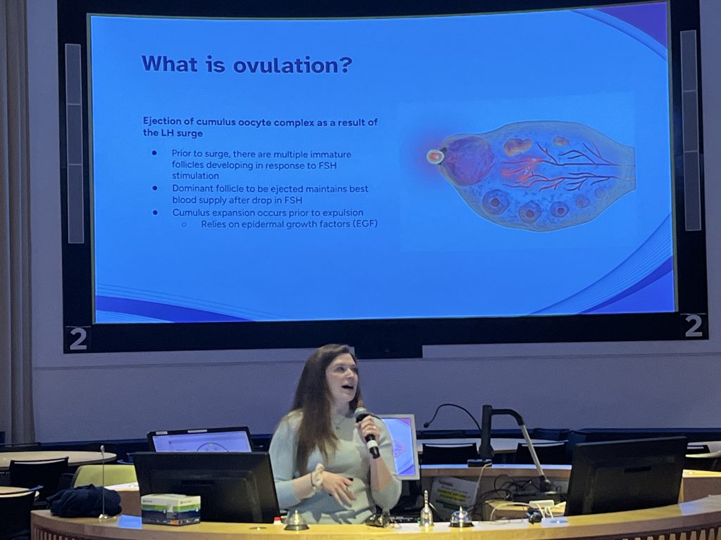 The soon-to-be future Dr. Cailyn Regan presenting her novel capstone project study findings in the Academic Rotunda on March 7.