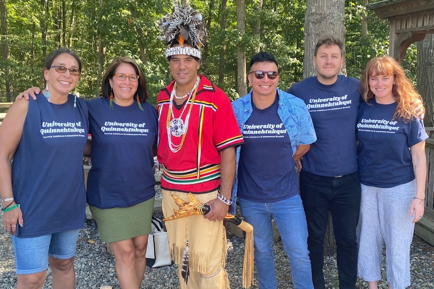 Butler, center, with the UConn Native American and Indigenous Studies team at the Mashantucket Pequot Tribal Nation powwow