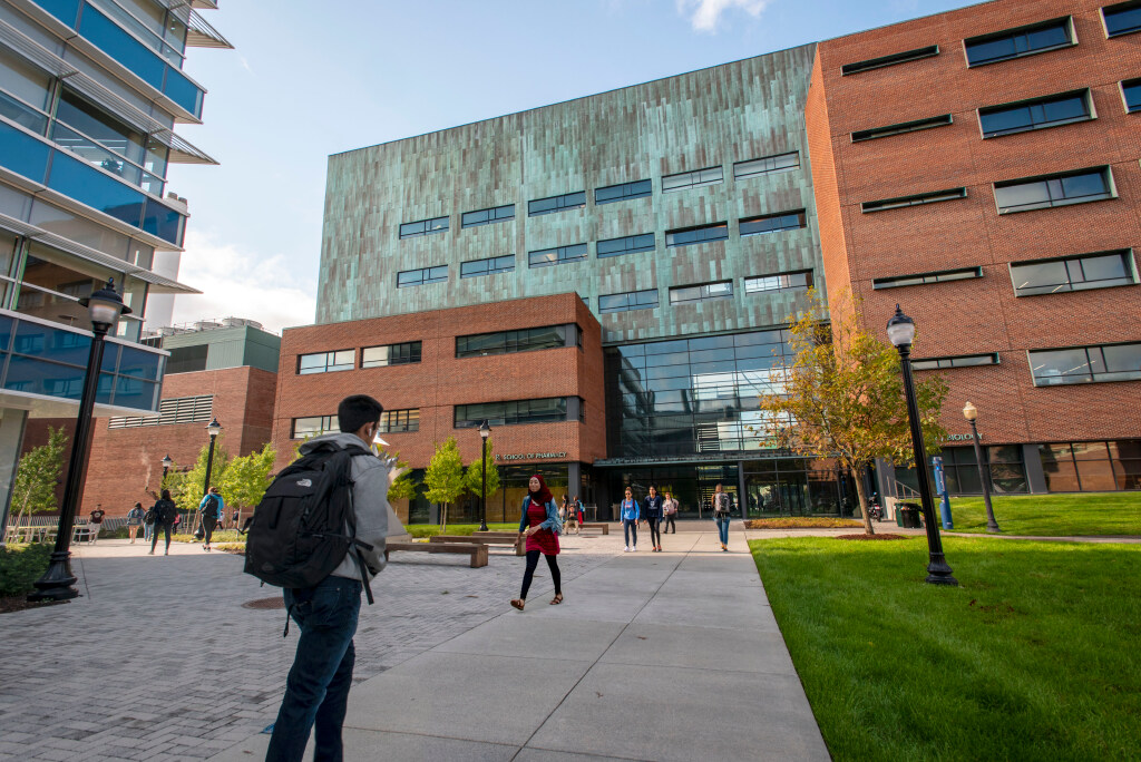 Students walking to and from the School of Pharmacy building on (UConn Photo)