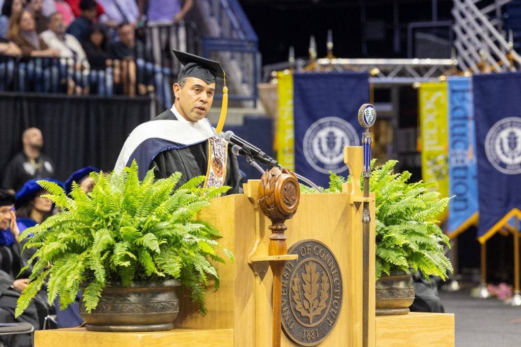 Man giving a speech at Commencement