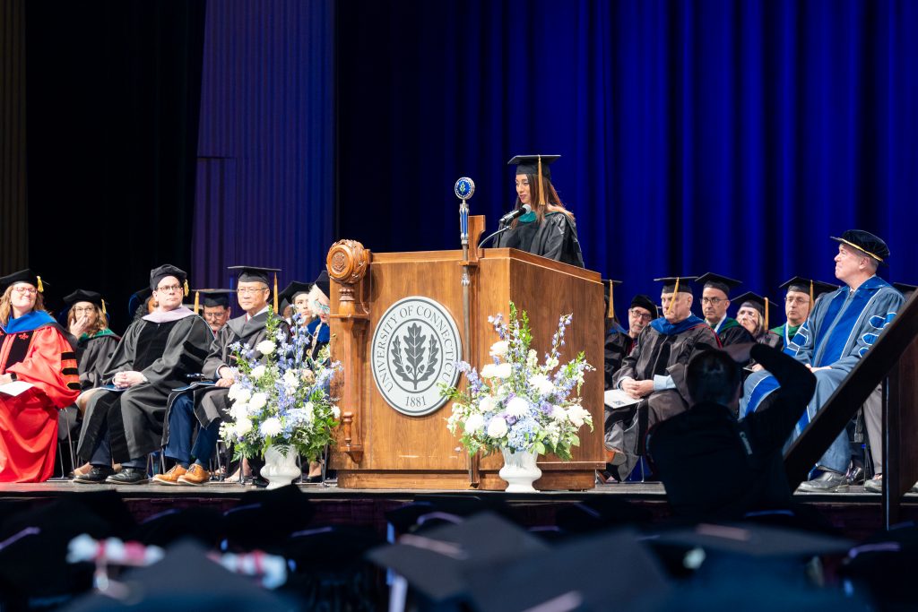 Dr. Manisha Juthani, Commissioner of the Connecticut Department of Public Health, gives the keynote address during UConn Health's Commencement ceremony in the Jorgensen Center for the Performing Arts on Monday, May 12, 2025. (Sydney Herdle/UConn Photo)