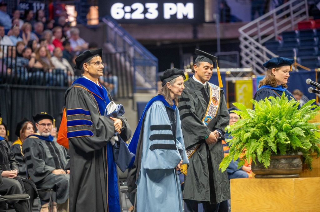 University leaders at the podium during Commencement