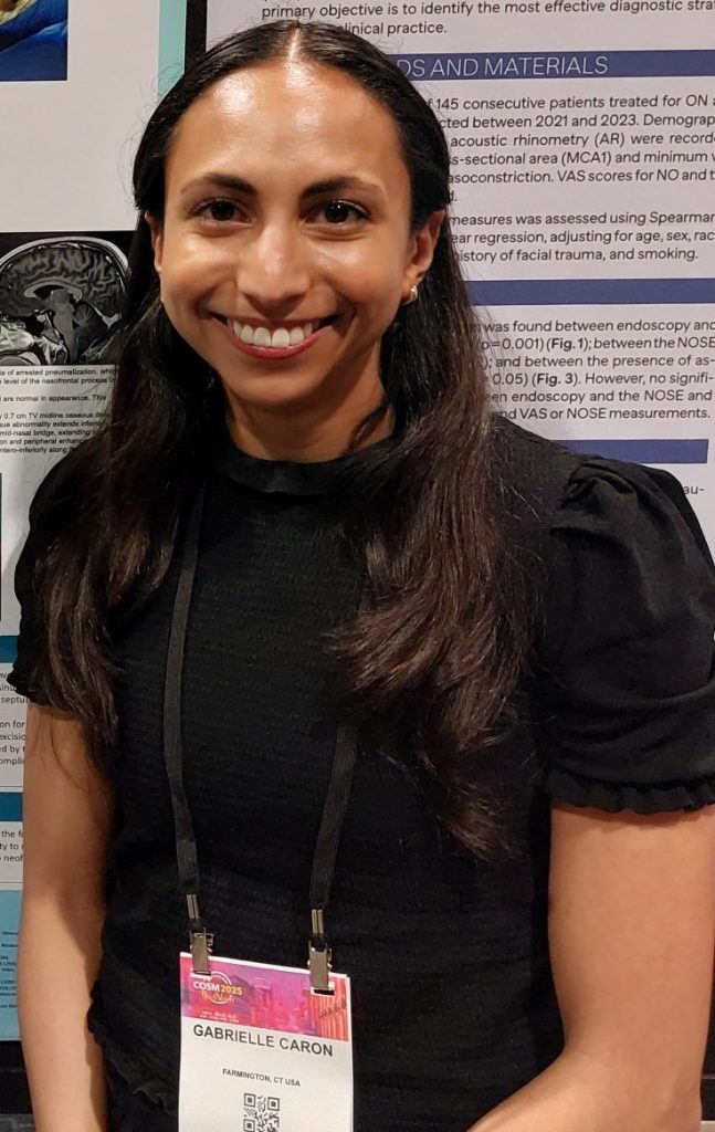 UConn SOM student Gabrielle Caron presenting her poster.