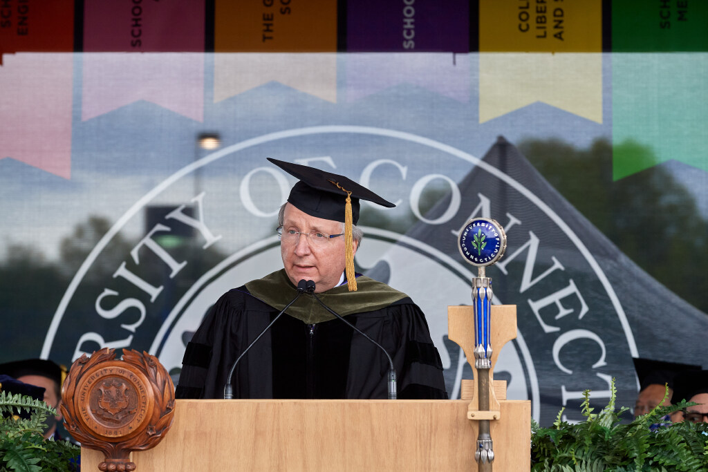 Dean Hritcko speaks during the Commencement ceremony in 2021 (Peter Morenus/UConn Photo)