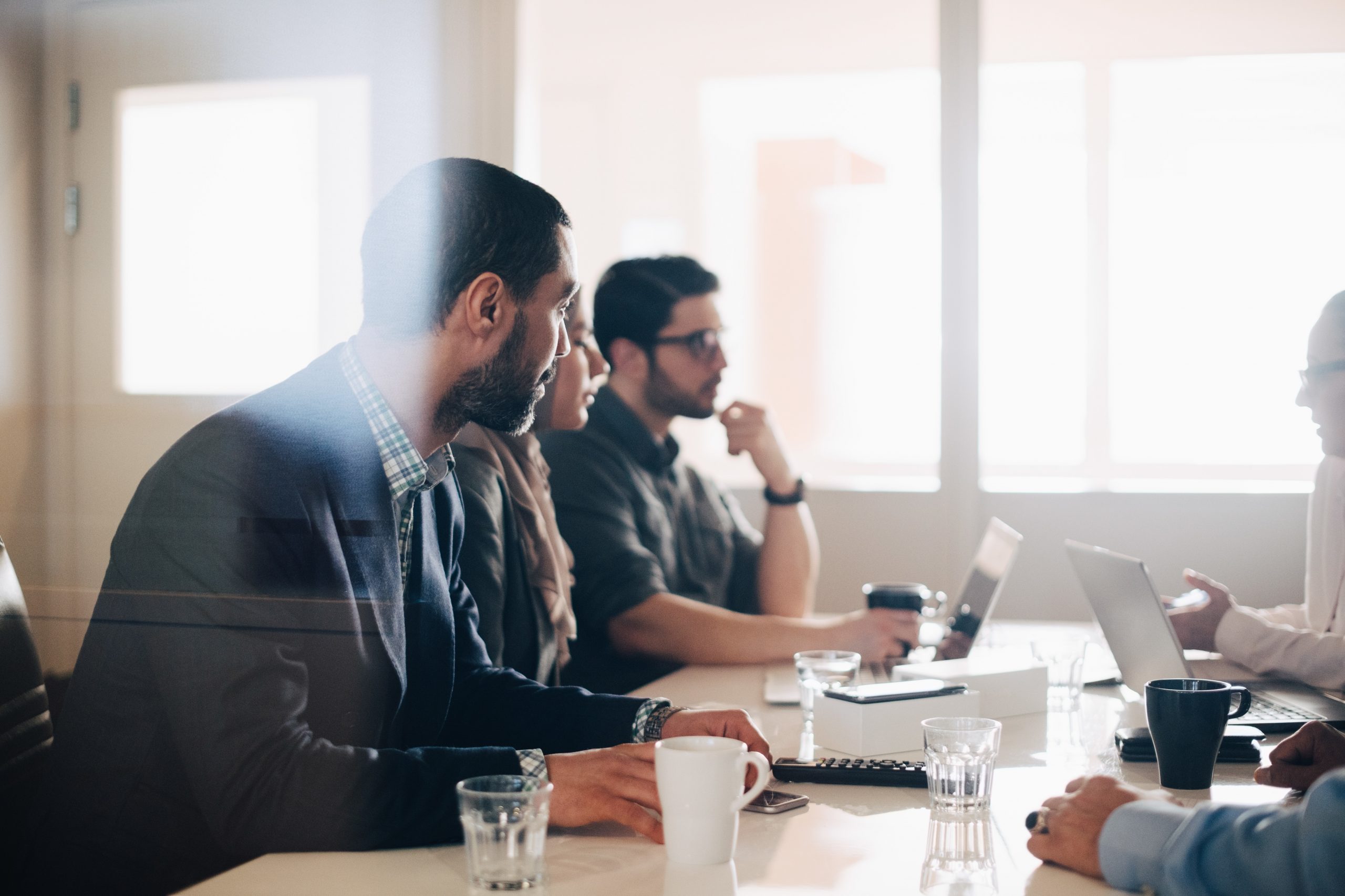Business people discussing in meeting at board room