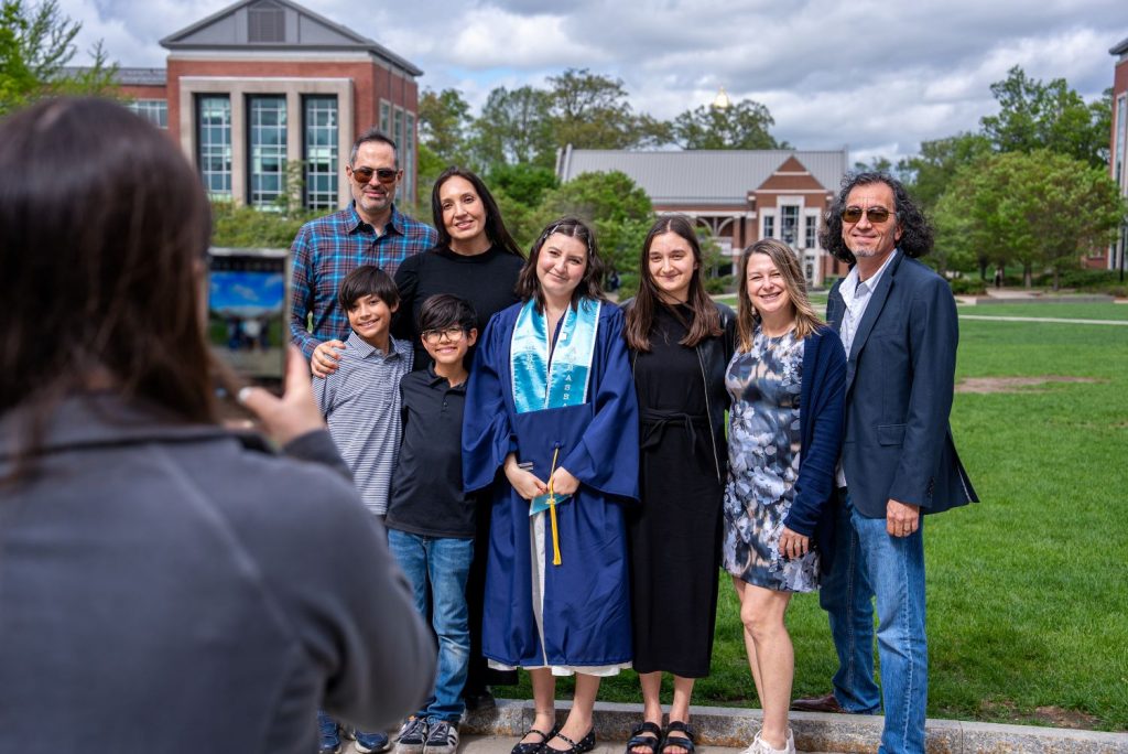 Family outside getting photos taken