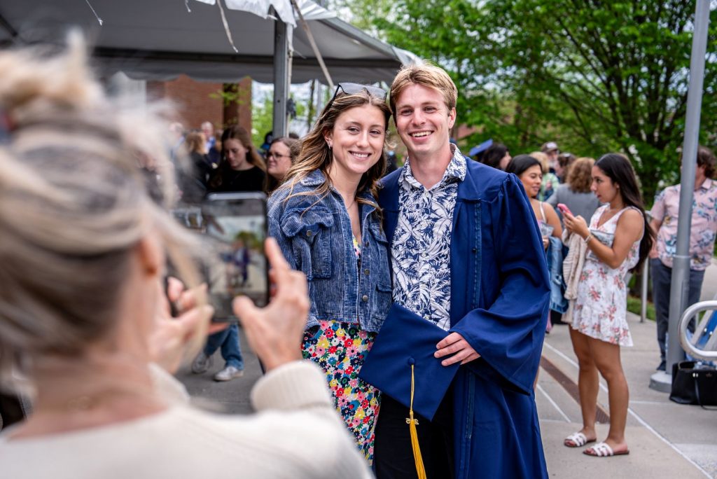 Students at a CAHNR reception before 2025 Commencement