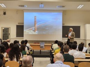 Mark Sarkisian lecturing in an engineering class