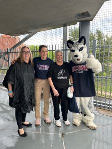 Dr Tannenbaum with patients and husky