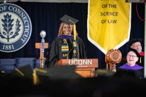 LLM speaker Lois Nnenna Owunna at the podium