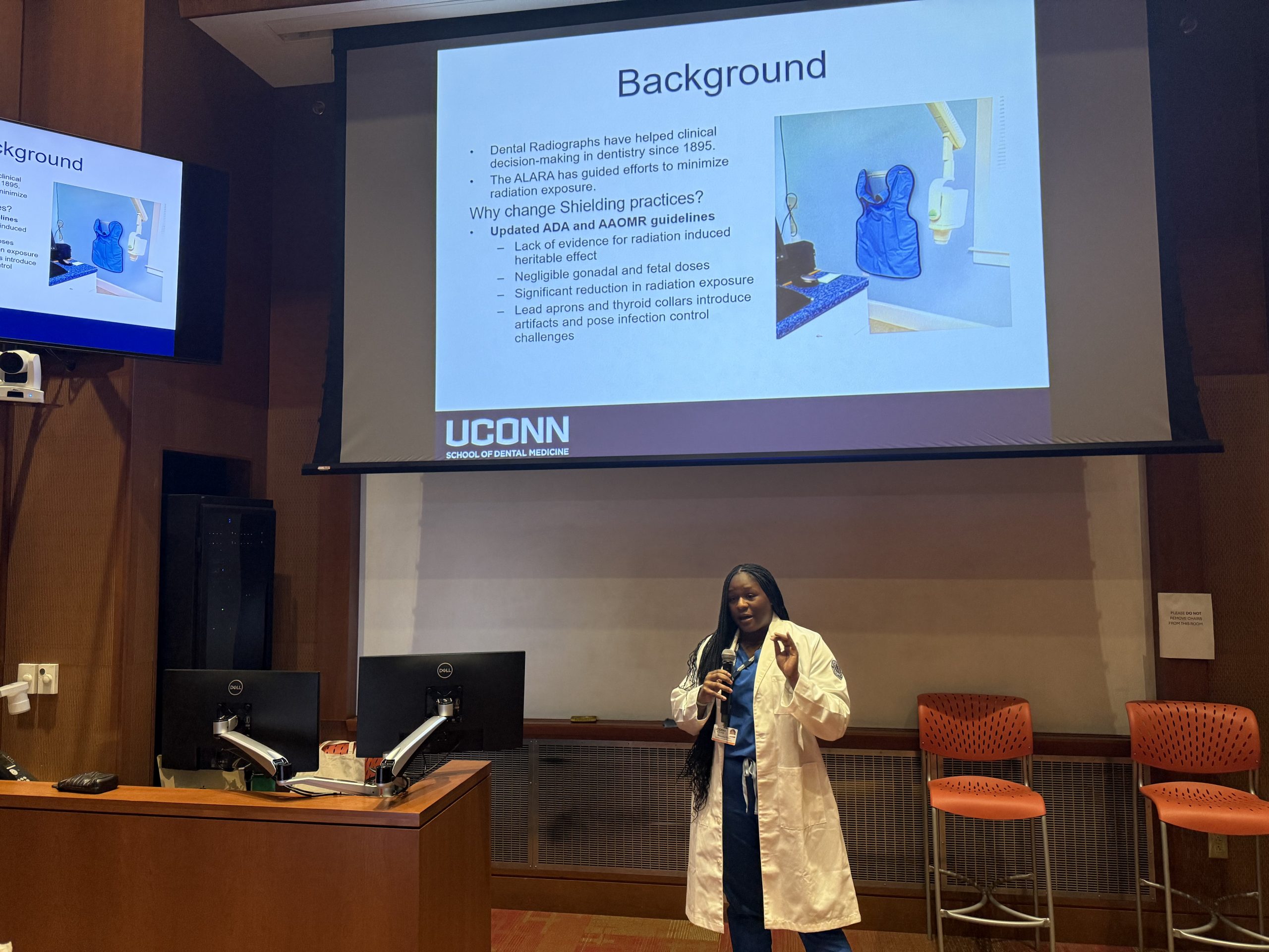 student presenting research