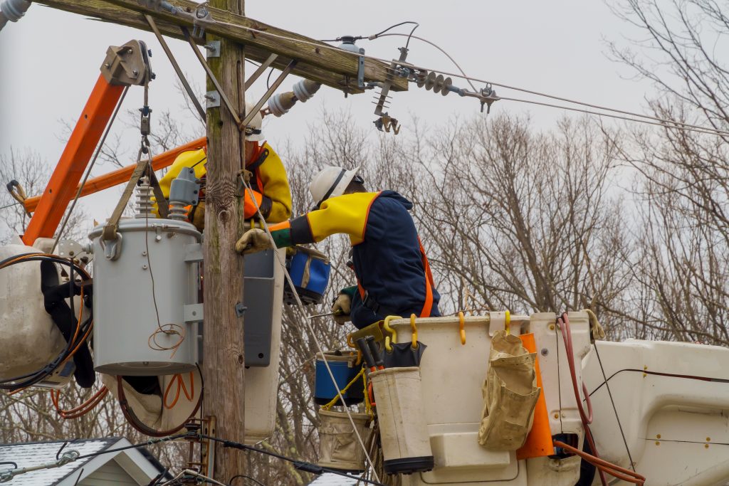 Utility crews working on restoring power and fixing damaged lines