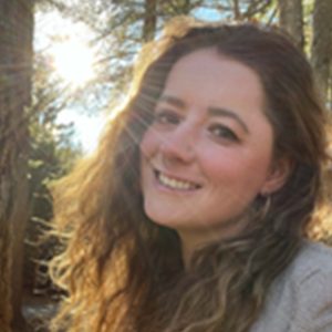 Portrait of a woman with the sun backlighting her head