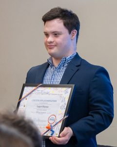 man holding certificate