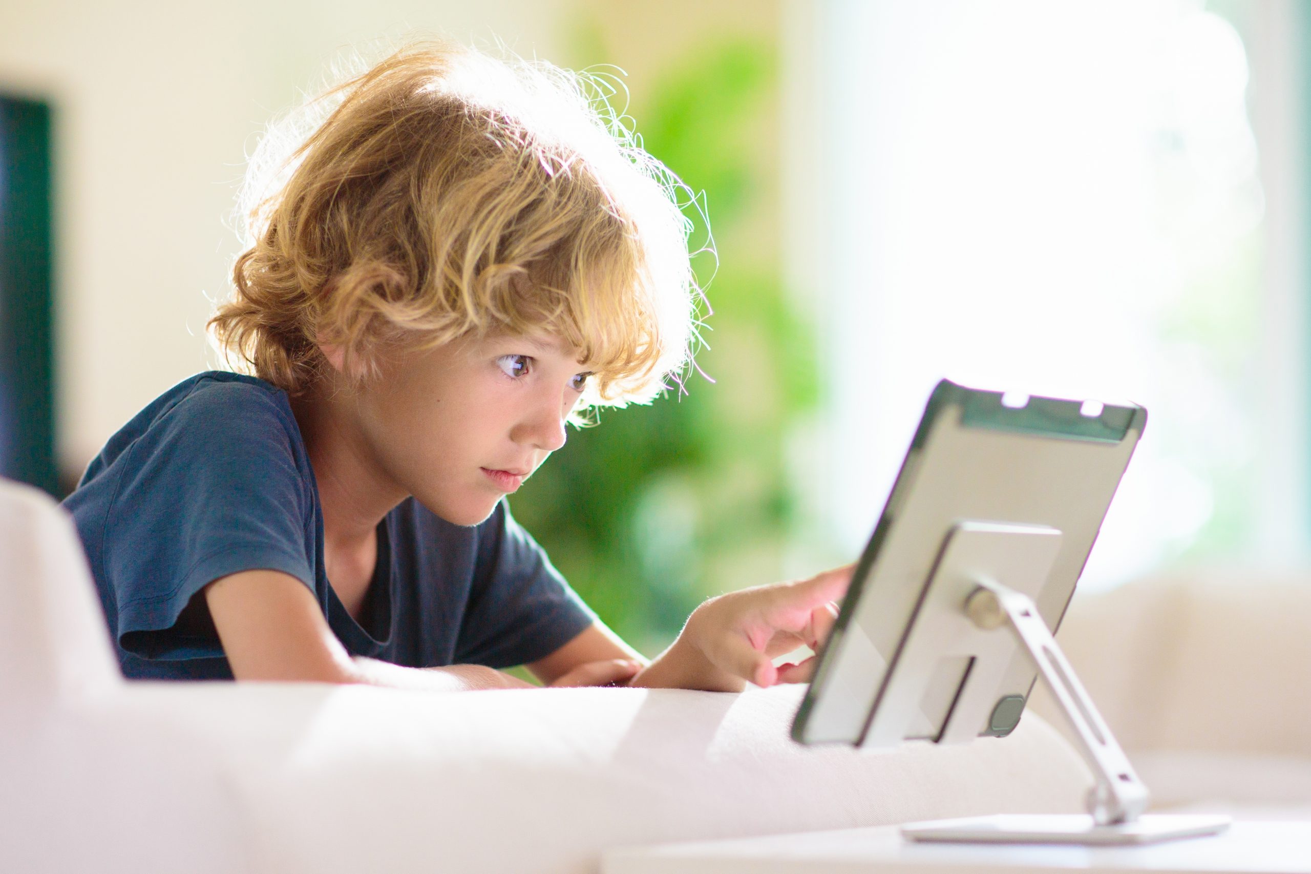 Young child watching a video on a tablet