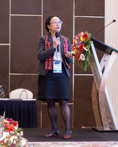 Anu Maharjan presenting at a conference