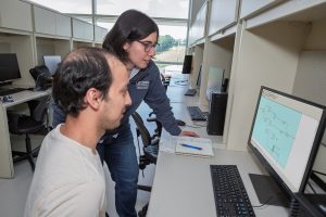 Burcu Beykal and Hasan Nikkhah in their lab