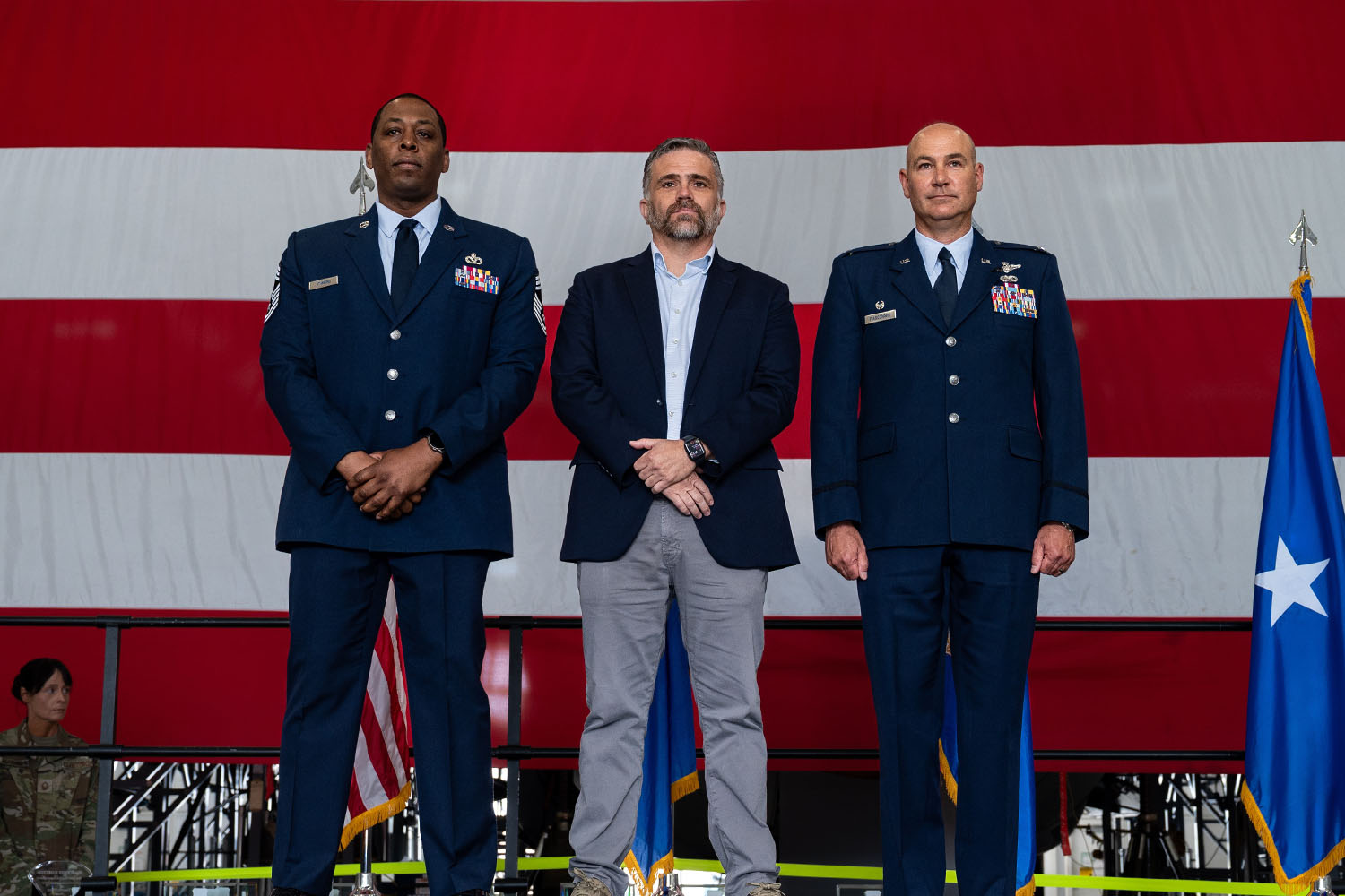 UConn MBA Program's Michael Bozzi was sworn in last month as an Honorary Commander for the Air Force National Guard's 103rd Maintenance Group. From left: First Sgt. Joe Stanford III, Bozzi, and Col. Paul Fiasconaro.