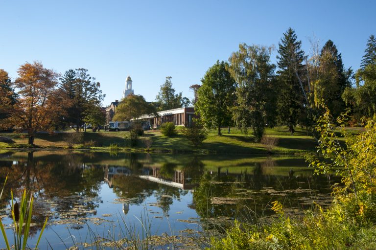 A view of the School of Nursing over Swan Lake on Sept. 30, 2013. (Sean Flynn/UConn Photo)