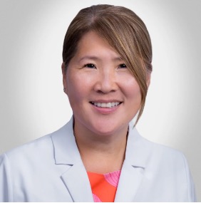 woman in white coat
