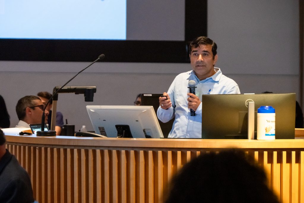 Dr Raj Verma speaking.