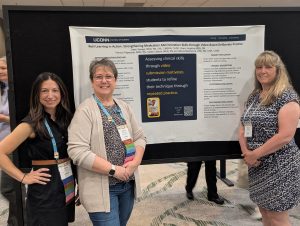 Dawn Sarage, Valorie MacKenna, and Sherri Hopkins with their poster at the International Nursing Association of Clinical Simulation and Learning conference in June 2025.