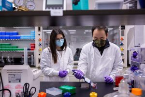 Olivia Vanegas conducts a laboratory training with psych Ph.D. students Carl Rodriguez and Antonio Matt Reck in the Kinsey Lab in Beach Hall.