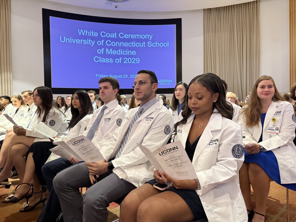Class of 2029 medical students in the Academic Rotunda at the 2025 White Coat Ceremony of UConn School of Medicine (Thomas Hurlbut Photography).