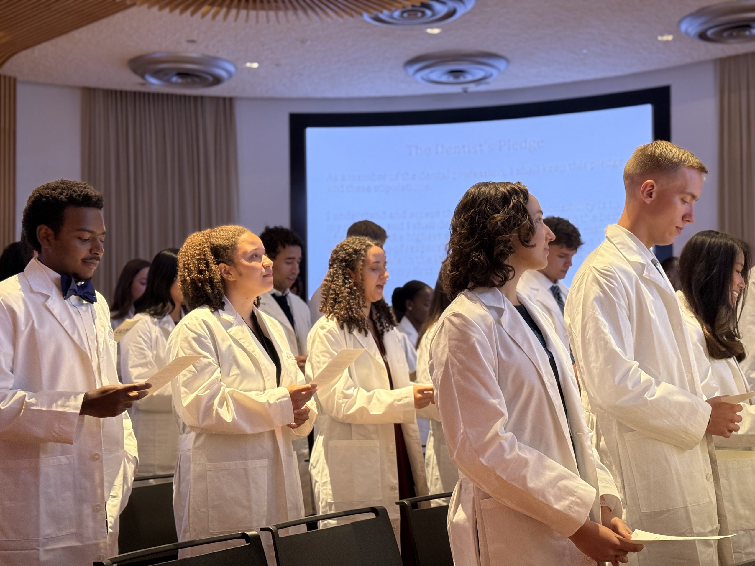 dental students in white coats