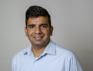 A man in a collared shirt