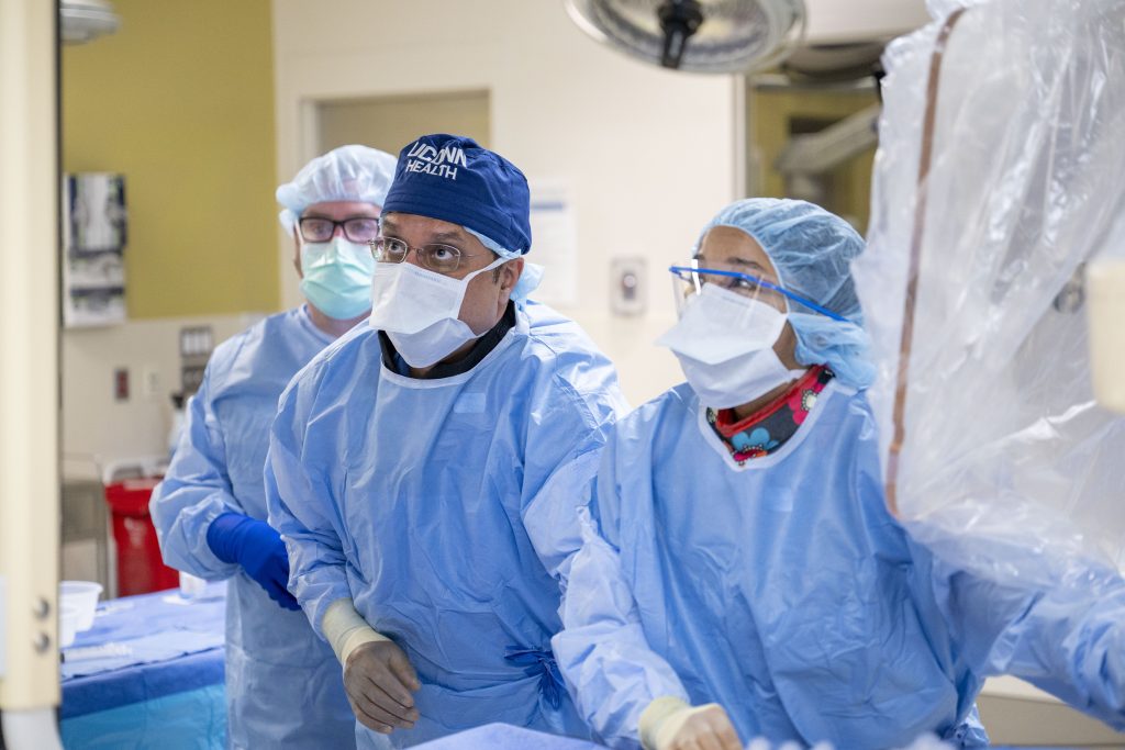 Dr. Bulsara and Dr. Burch in the OR