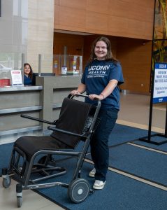 Sarah Gerard pushing a wheelchair