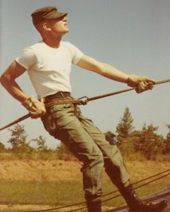 Sidney Hopfer holding rope in an Army training excercise