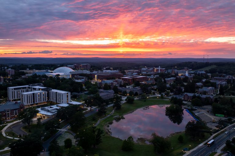 The sun sets on the UConn campus in Storrs