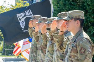 UConn Air Force and Army ROTC cadets salute the colors