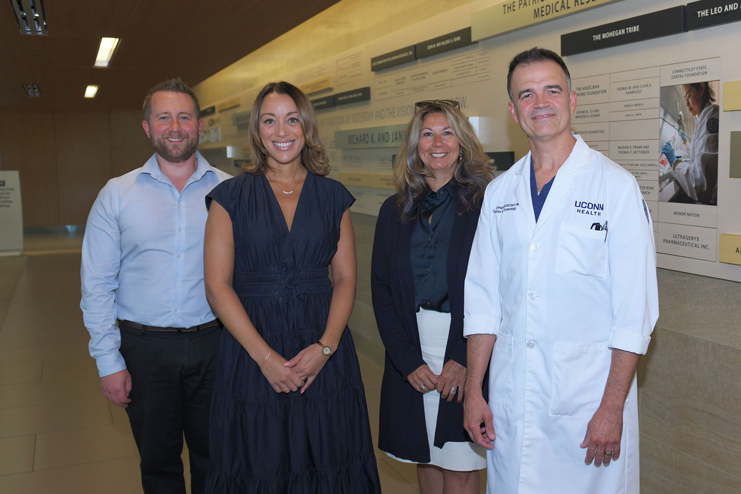 portrait of 4 indoors, male, female, female, male