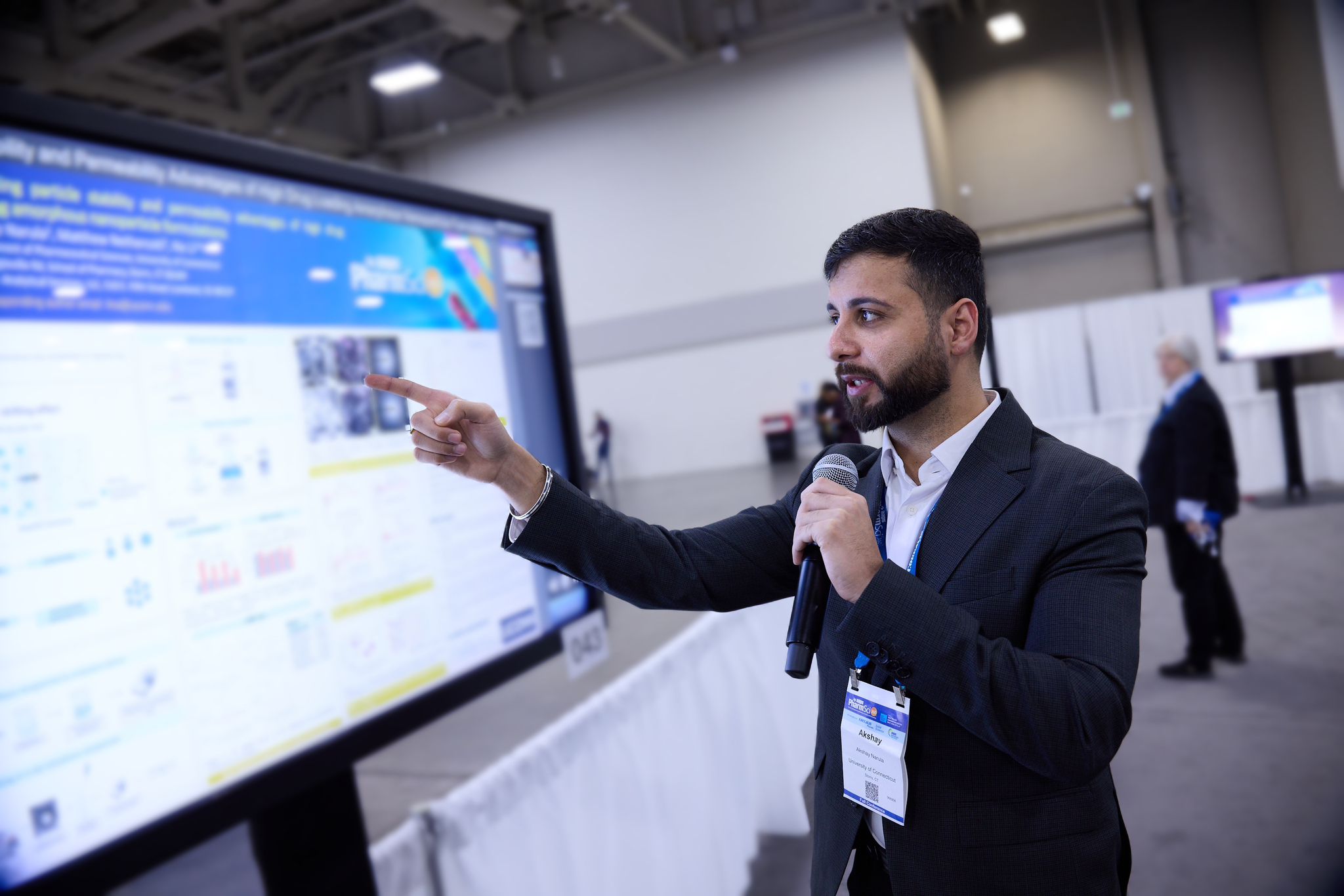 Akshay presenting his research at