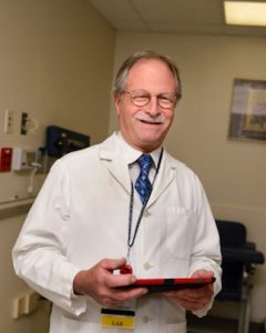 Dr. Sidney Hopfer environmental portrait indoors