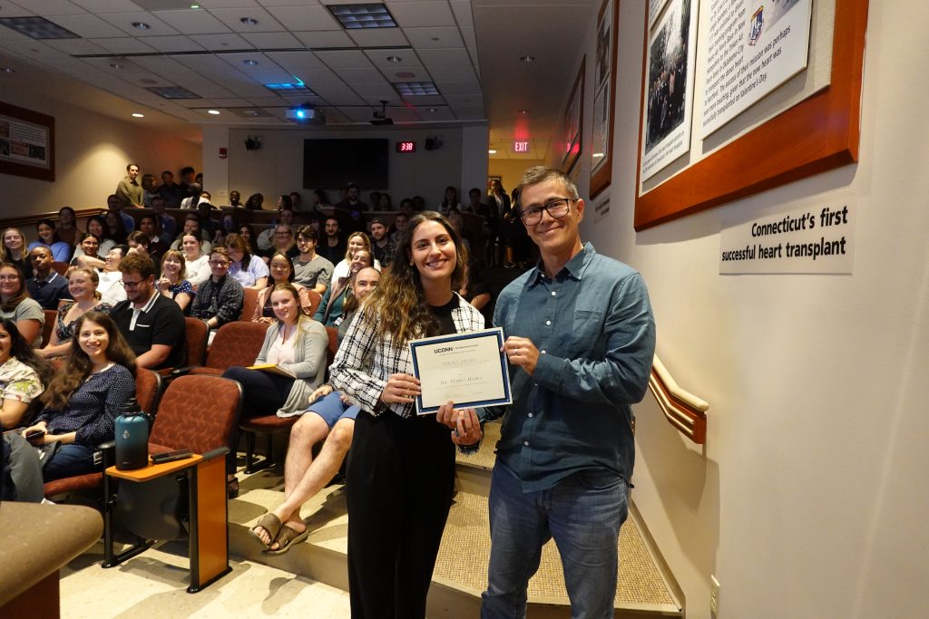 Graduate Student Organization president Perla El Ahmad with Pedro Miura