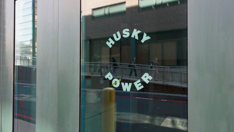 A window with a decal reading 