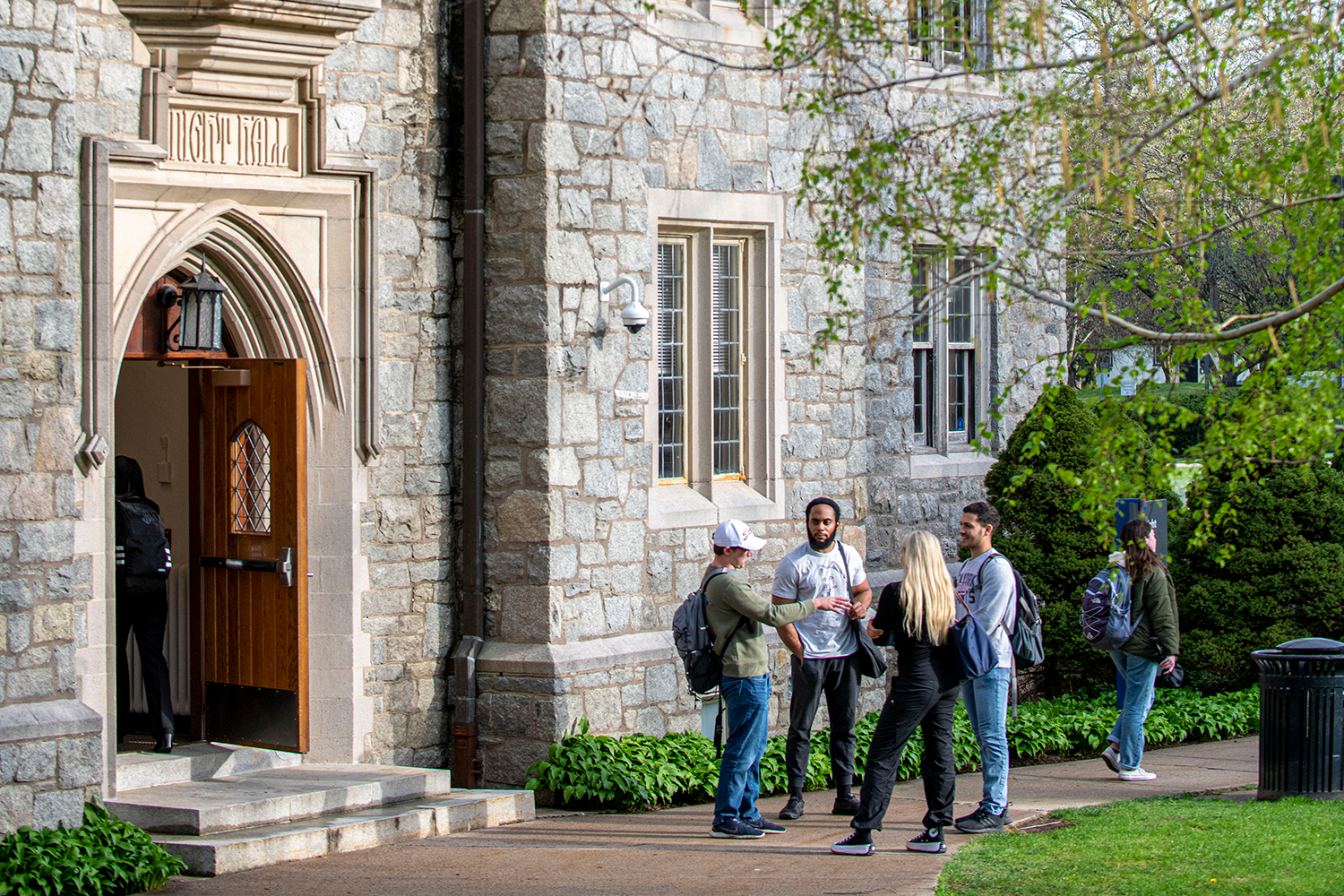 Students stand outside the UConn Law Library.