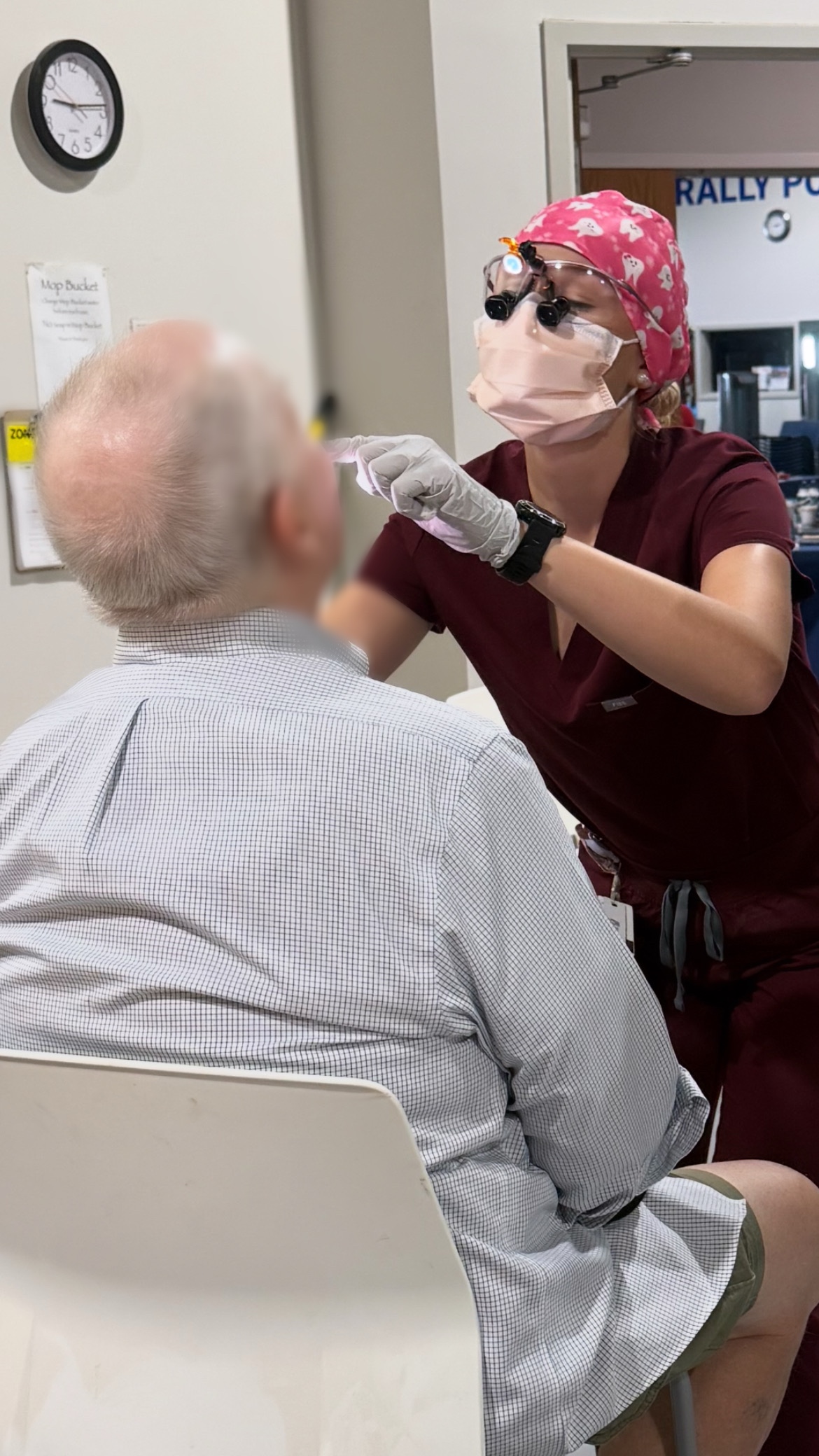 Female dentist doing exam