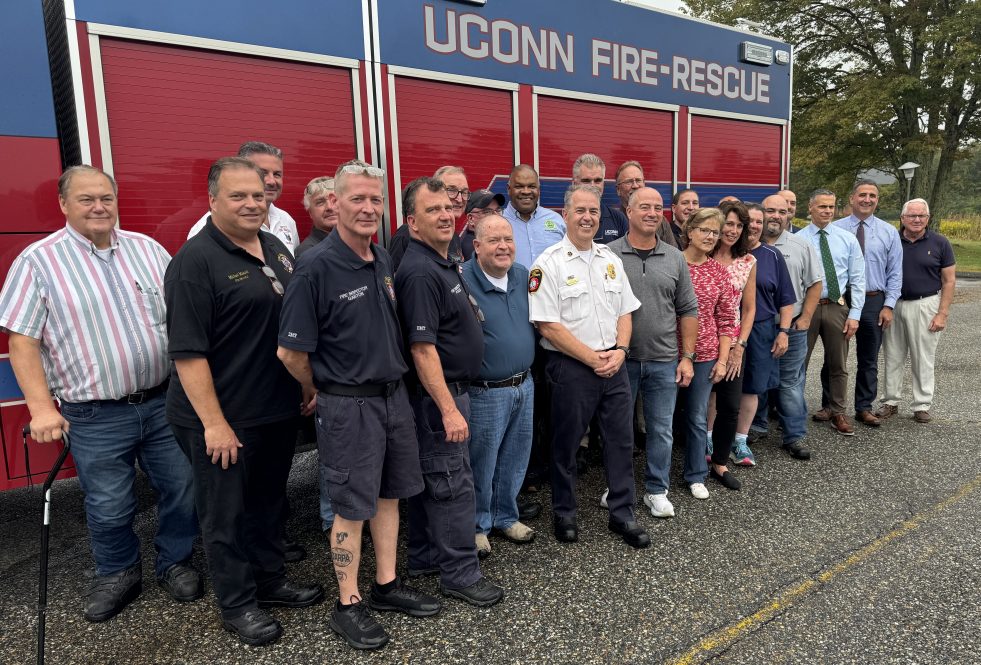 Former UConn fire and police officials gather to celebrate the Fire Marshall Office.
