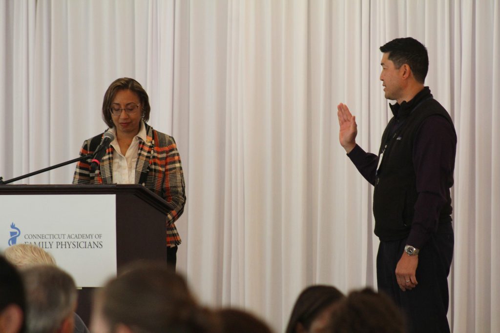 President-elect of AAFP Dr. Kisha Davis installing fellow UConn SOM graduate Dr. Ed Kim as the new president of the CT AFP chapter on Oct. 30, 2025 (Photo courtesy of CT AFP)